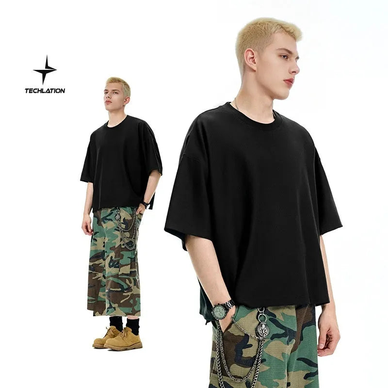 Men's sand grey loose fit short sleeve cotton polyester t-shirt laid flat.