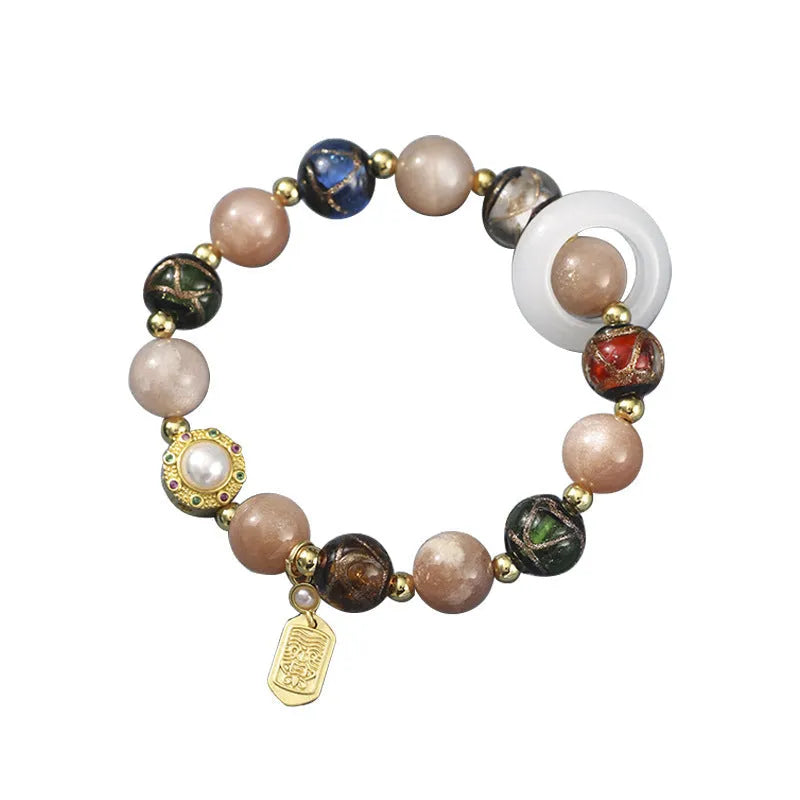 Hand-woven coloured glaze bracelet with Sunstone and white lip shell beads