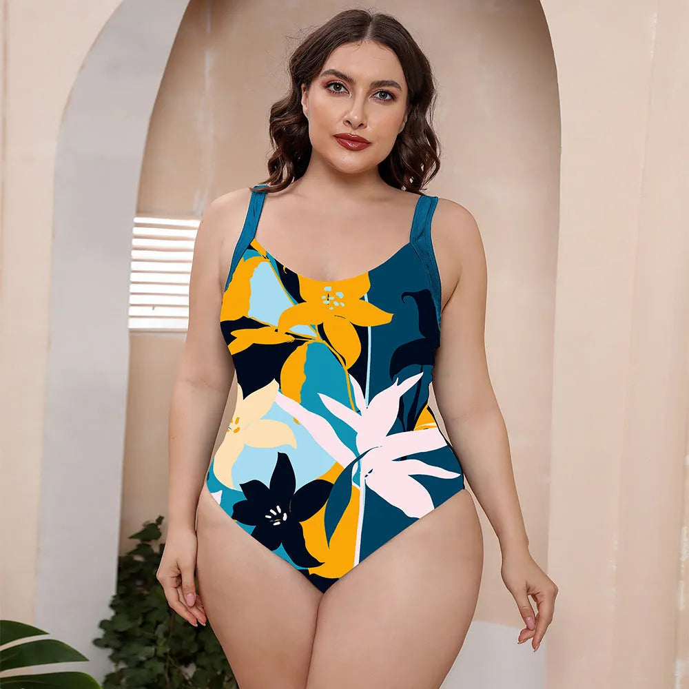 Conservative vest-style one-piece floral print swimsuit with spaghetti straps on a mannequin.