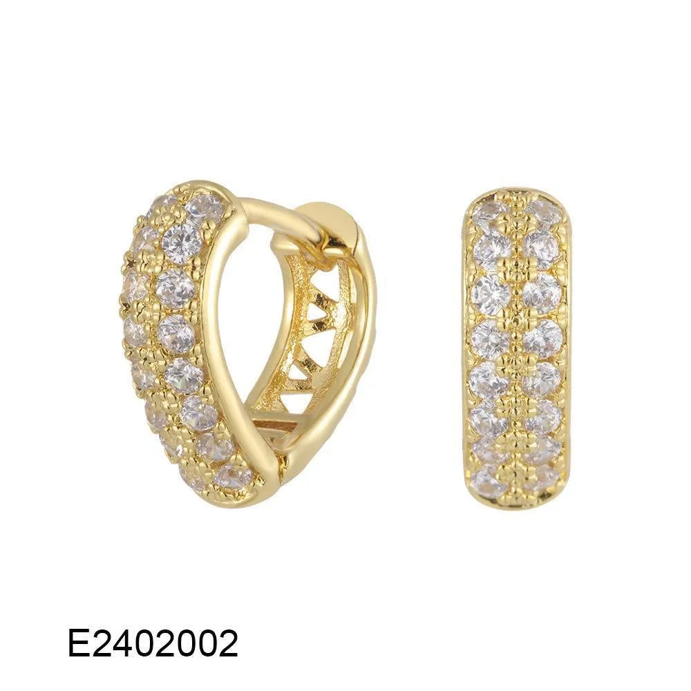 Brass gold plated heart shaped ear clip earrings with gang drill texture on copper construction