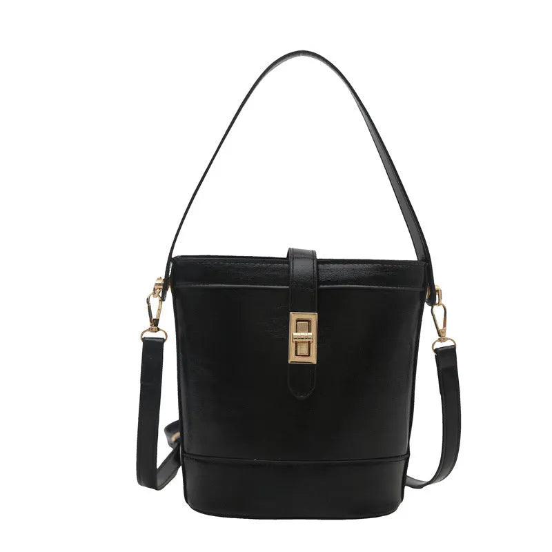 Women's one shoulder crossbody bag bucket shape in PU leather, available in black, brown, khaki, white. Width 19cm height 18.5cm.