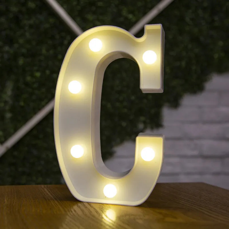 White plastic LED marquee letter sign with warm white glow, 22cm tall