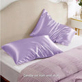 A pair of solid-colour satin cloth pillowcases in one of 13 available colours, shown in a standard pillow size.