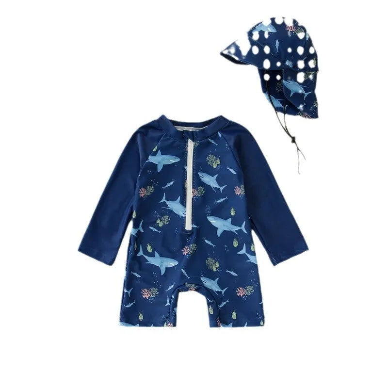 Children's one-piece jumpsuit swimsuit with matching hat in dark blue shark print, made from polyester