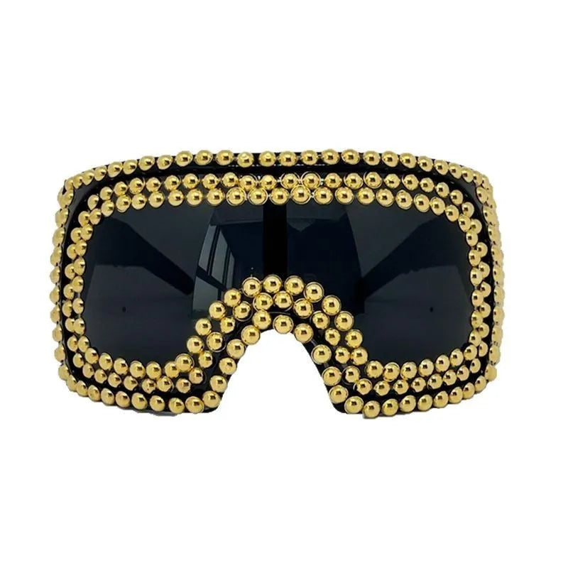 Men's silver punk sunglasses with large square frames and metal rivet details on the temples.
