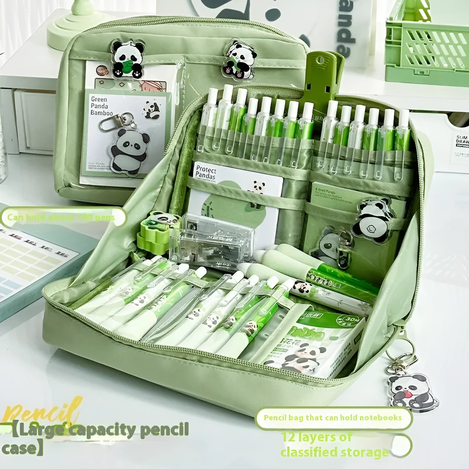 Green canvas panda pencil case showing twelve layered compartments open to reveal storage space