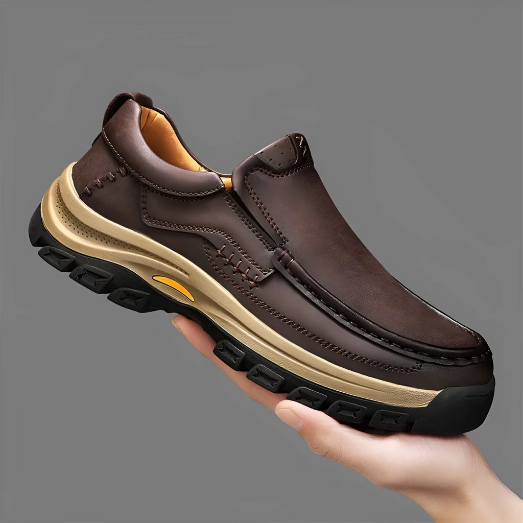 Men's black mountaineering shoes with thick rubber soles and stitched PU leather upper