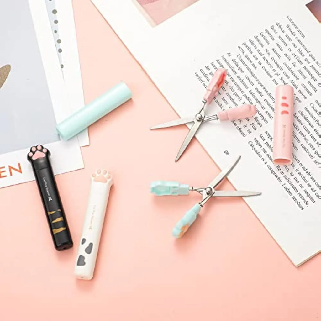 Cat paw design mini folding safety scissors in four colour options showing compact 8.7cm size