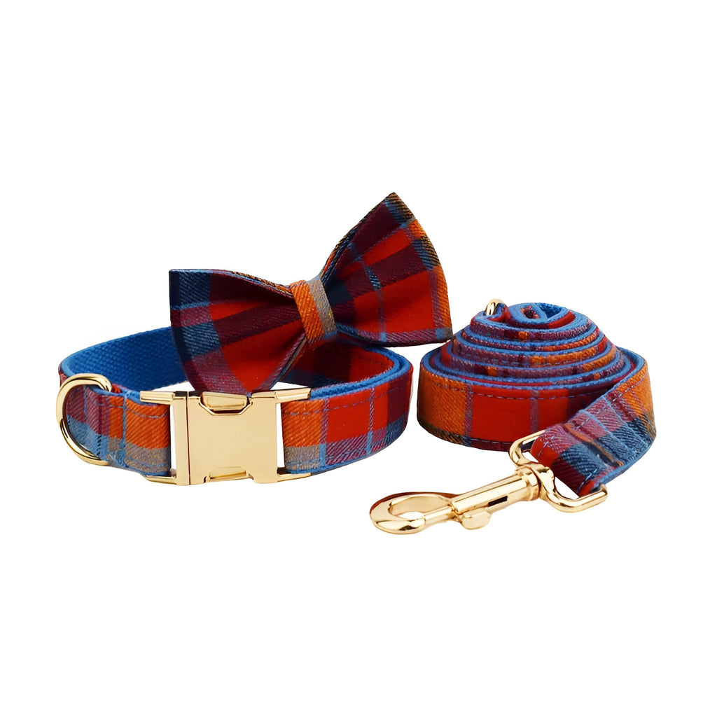Blue velvet plaid dog collar with integrated hand-holding rope and leash set on cloth material