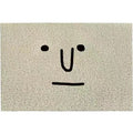 Cartoon facial expression PVC floor mat with Mr. Big Nose geometric pattern, shown in a square shape with a wire ring border.