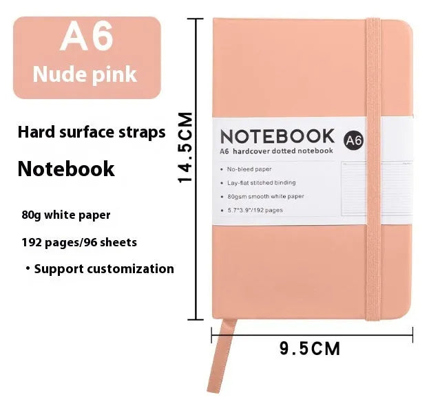 A5 size notebook with soft skin-feel PU leather cover and strap closure, open to show horizontal lined pages.