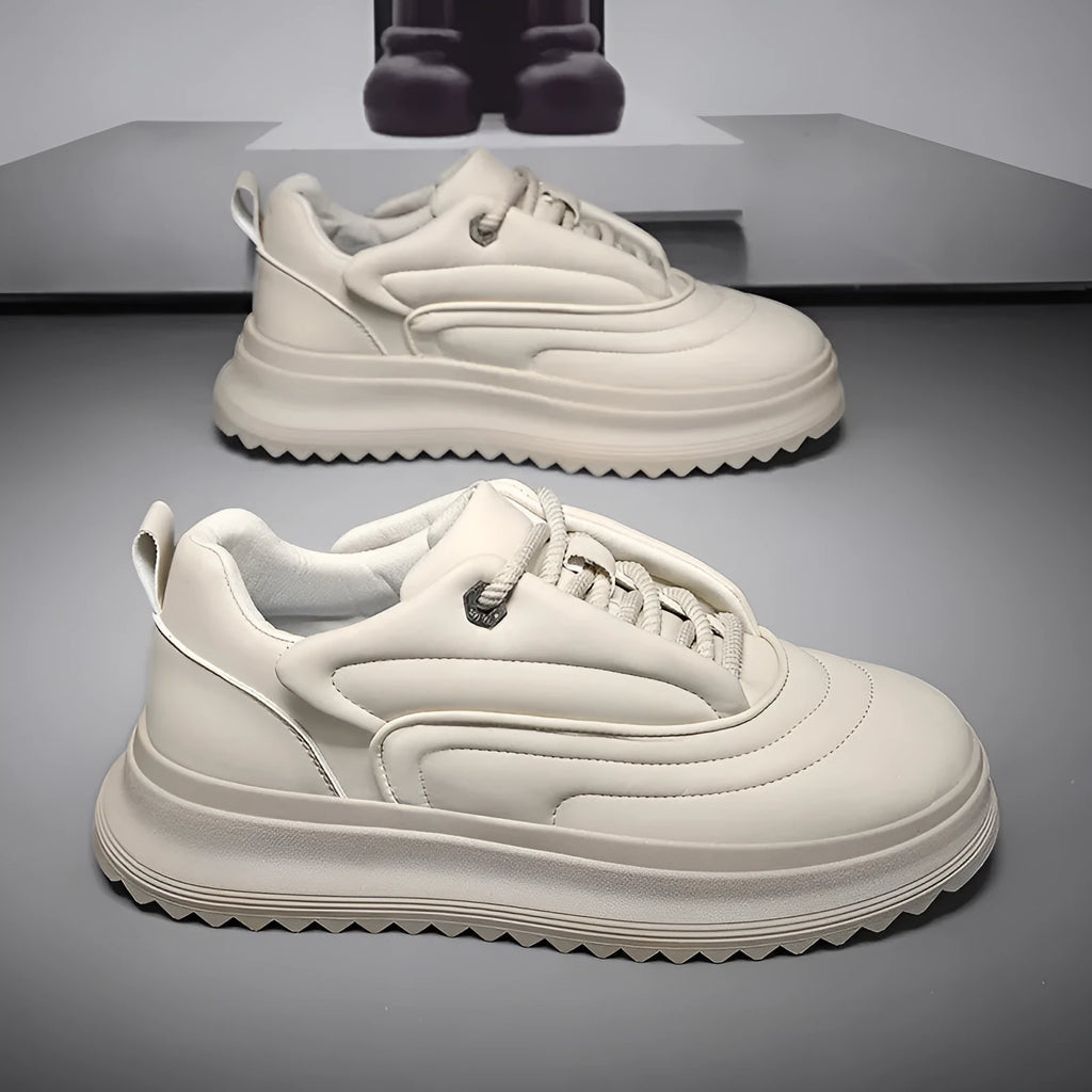 Unisex casual leather trainers with a thick platform sole in black, white, and khaki colour options.