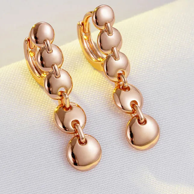Retro gold woven circle earrings with copper construction and 4.5 cm diameter