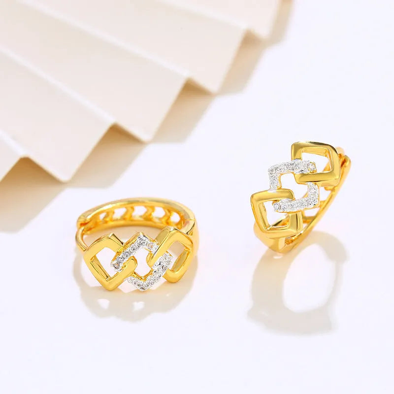 Gold geometric hollow-out earrings with electroplated alloy construction and ear clip fastening