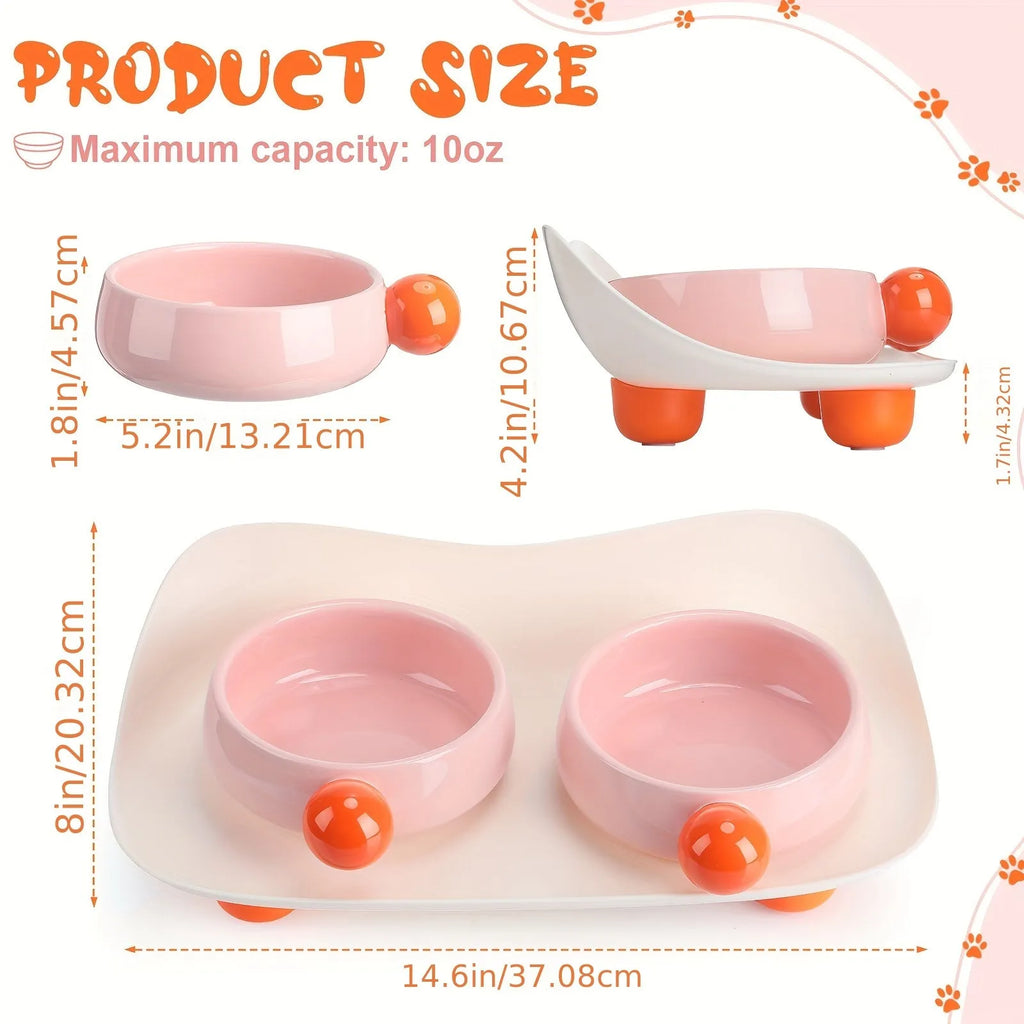 Pink elevated ceramic double bowl set for cat food and water on a non-slip base.