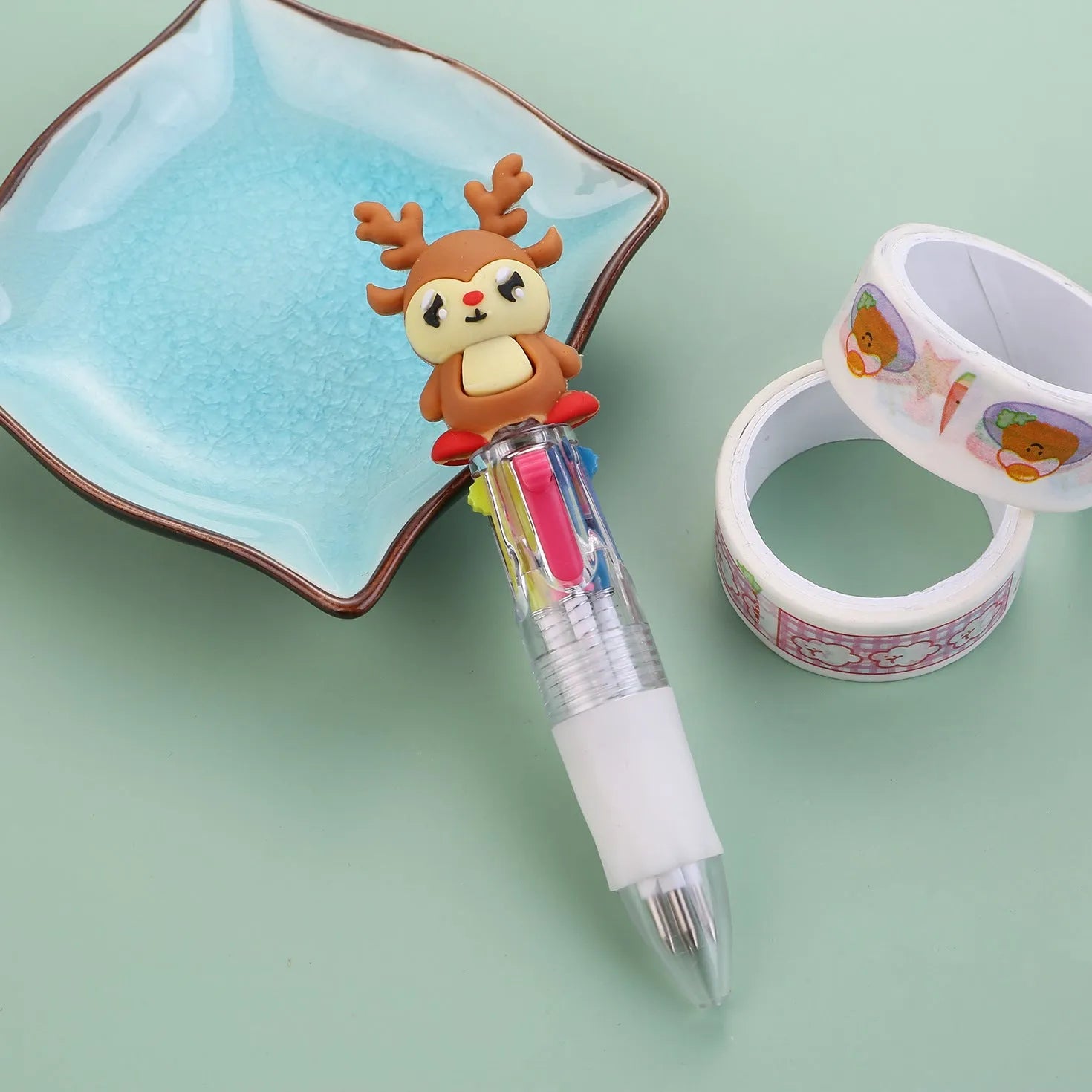 Christmas four-colour press ballpoint pen with festive designs, 11cm compact size
