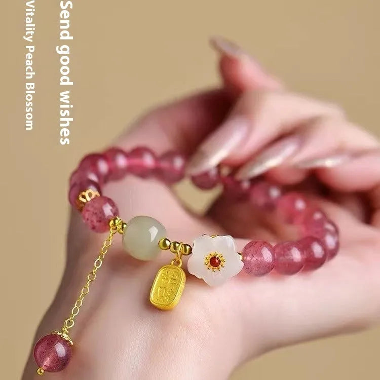 Handmade strawberry quartz crystal bracelet with Hetian jade peach blossom accents in natural style
