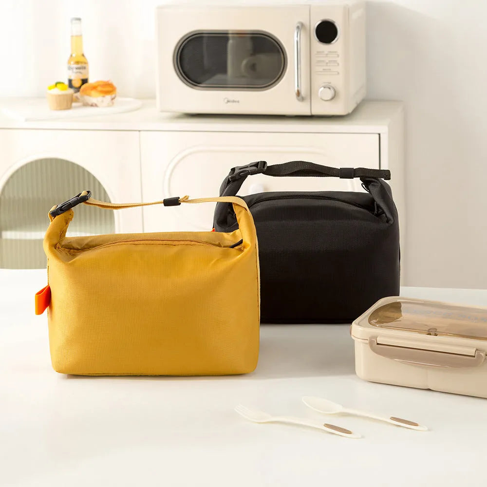 Japanese-style insulated lunch bag in Oxford cloth, shown in grey, black, yellow, and army green colours.