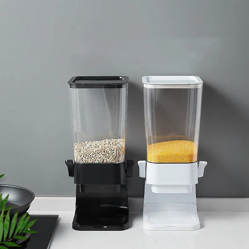 Countertop cereal dispenser in black with 5.5 quart capacity, chute opening, and removable tray