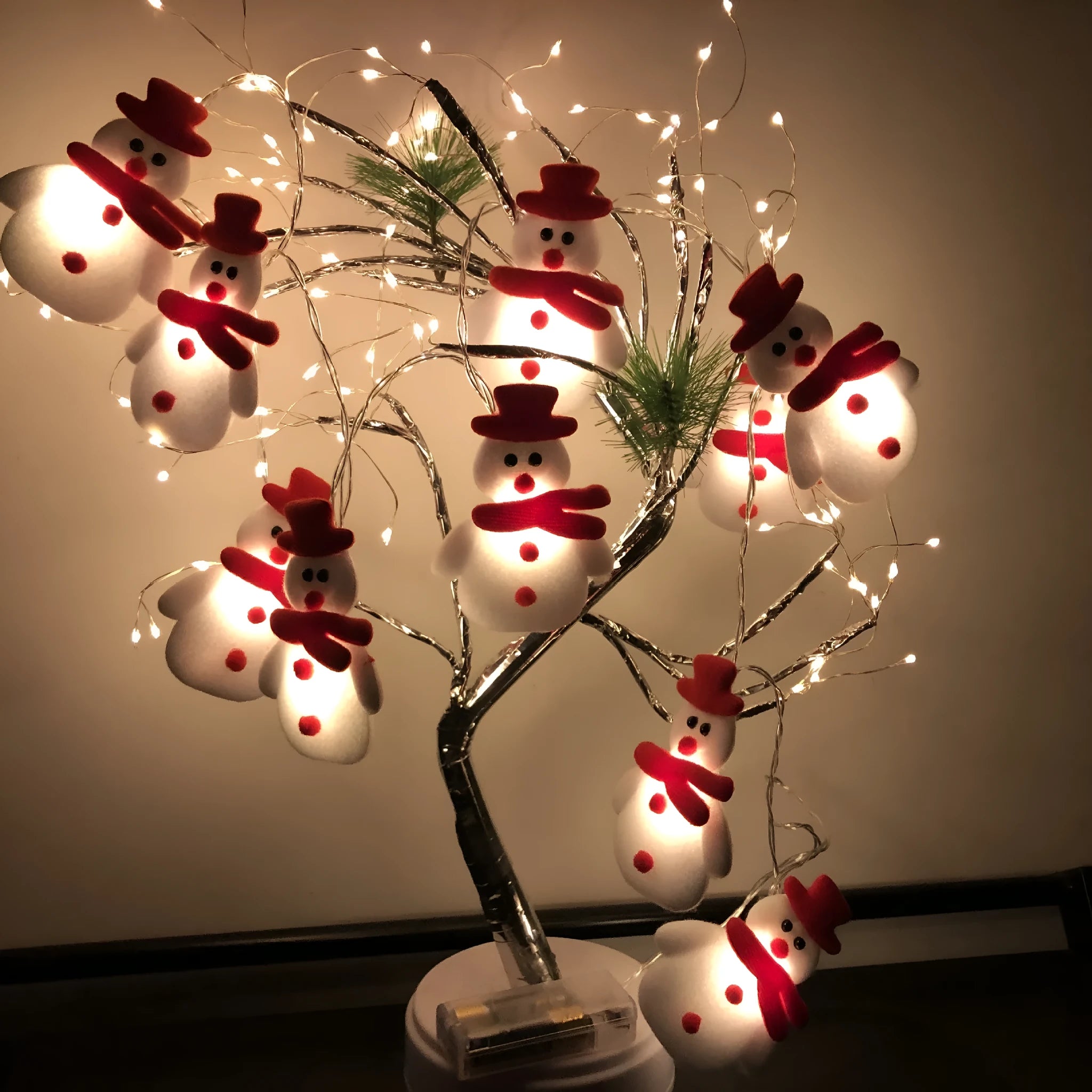 Christmas snowman LED string lights garland with warm white bulbs and character decorations