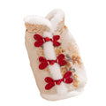 Pet Chinese New Year Tang suit coat with frog knot closure, brocade fabric, and fluffy fur trim on a small dog