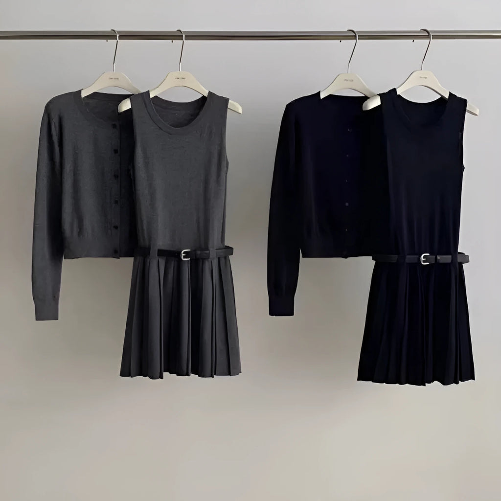 Grey knitted two-piece set with 3D pattern, featuring a belted vest skirt and long-sleeve cardigan.
