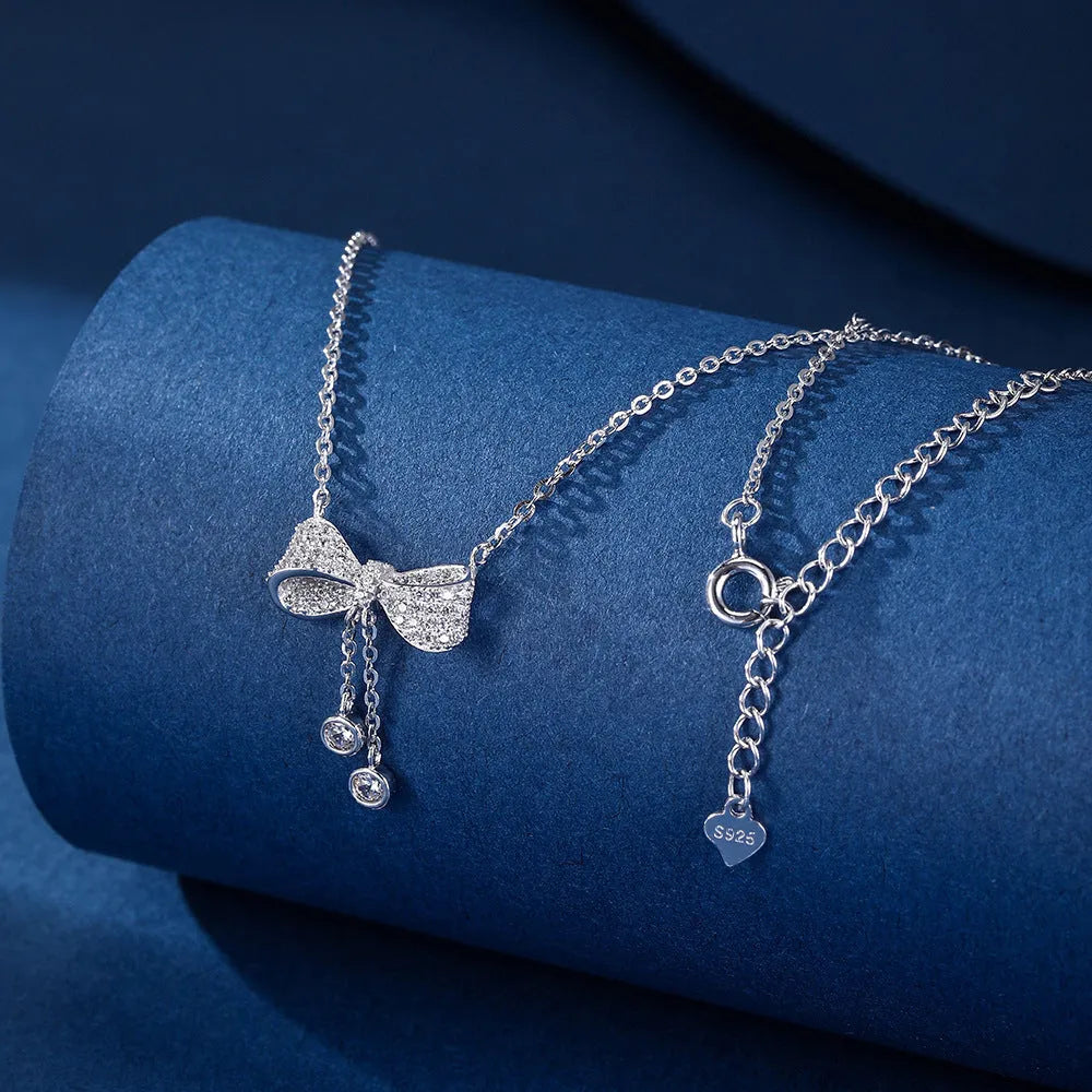 S925 sterling silver bow pendant necklace on O-ring chain, silver electroplated finish