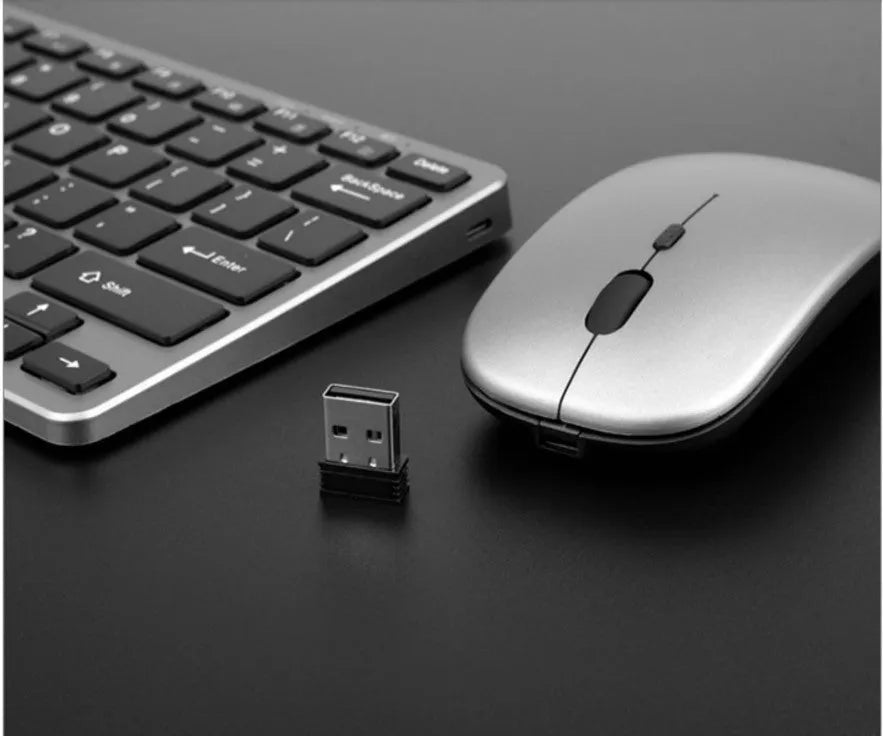 Compact 78-key Bluetooth wireless keyboard in silver white or black with USB charging interface