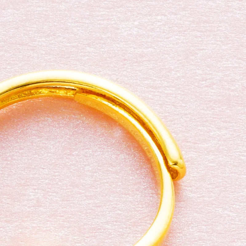 Women's adjustable copper ring with electroplated Vietnam placer gold zircon in six colour options.