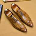 Men's black leather business shoes with alligator pattern texture and a gold horse bit buckle.