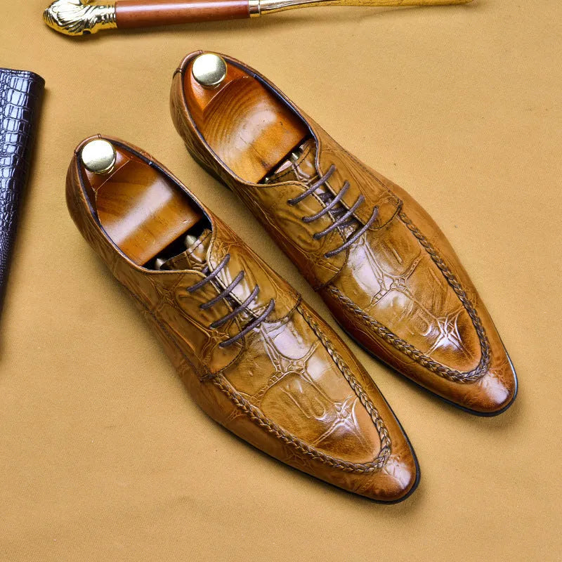 Men's black leather business shoes with alligator pattern texture and a gold horse bit buckle.