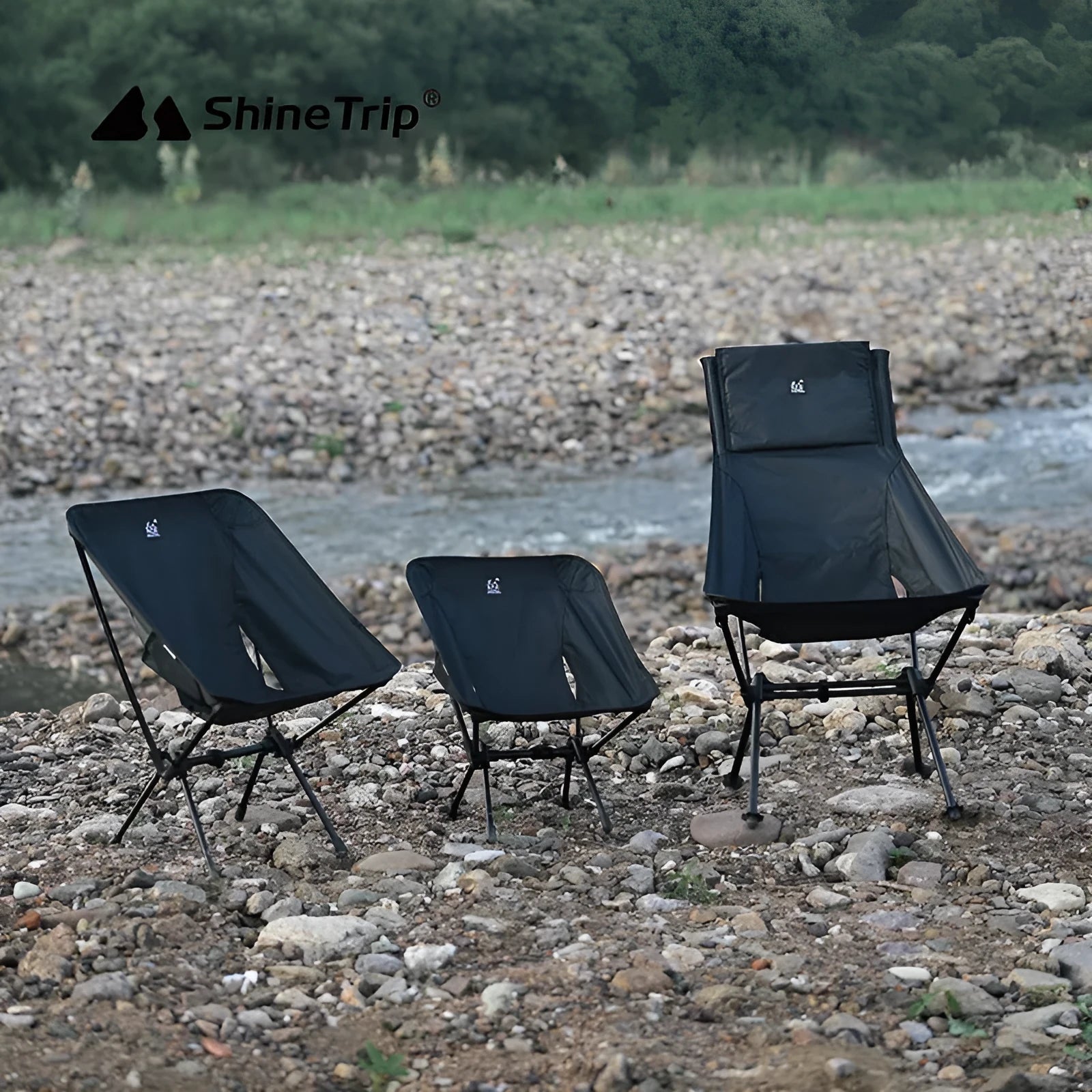 Lightweight aluminium folding moon chair in a garden setting, shown in sand colour with a high back.