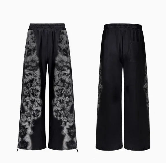 Women's printed loose-fit co-ord set showing hoodie, trousers, and seven-inch shorts together