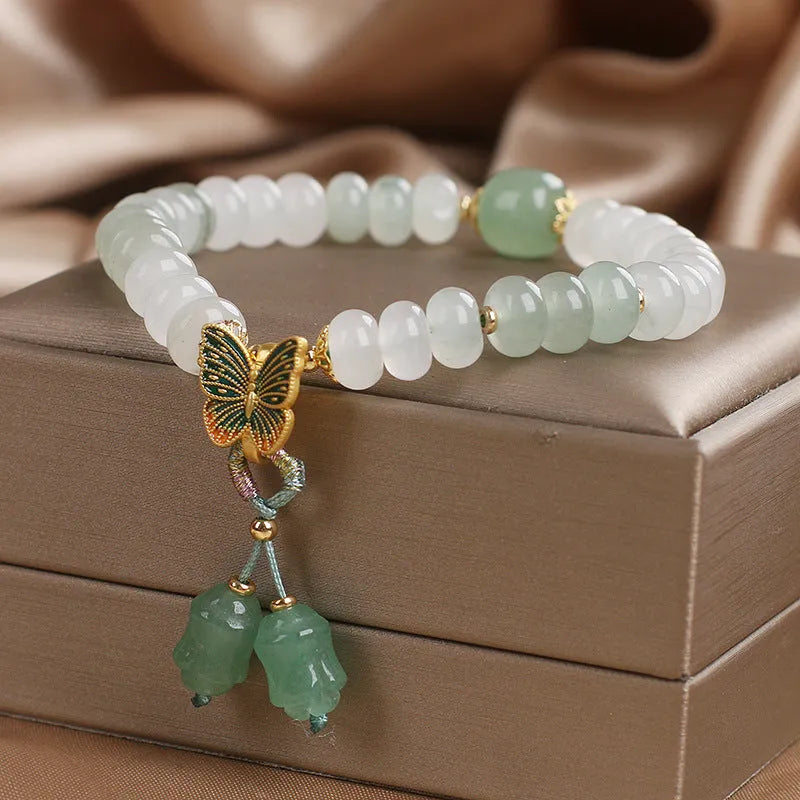 Green Tian Shan Cui abacus beads jade bracelet with retro butterfly and crystal tassel decoration