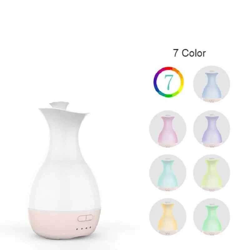 White ultrasonic humidifier with colourful night light functioning as aromatherapy diffuser and flower vase