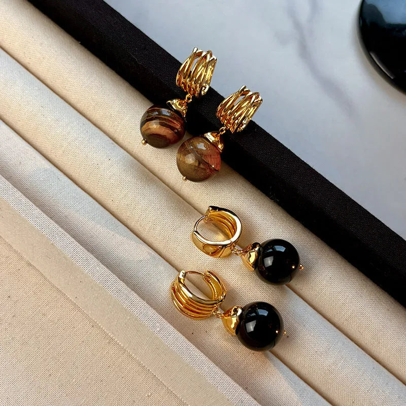 Gold-plated tigereye stone earrings with geometric round shape in French retro style