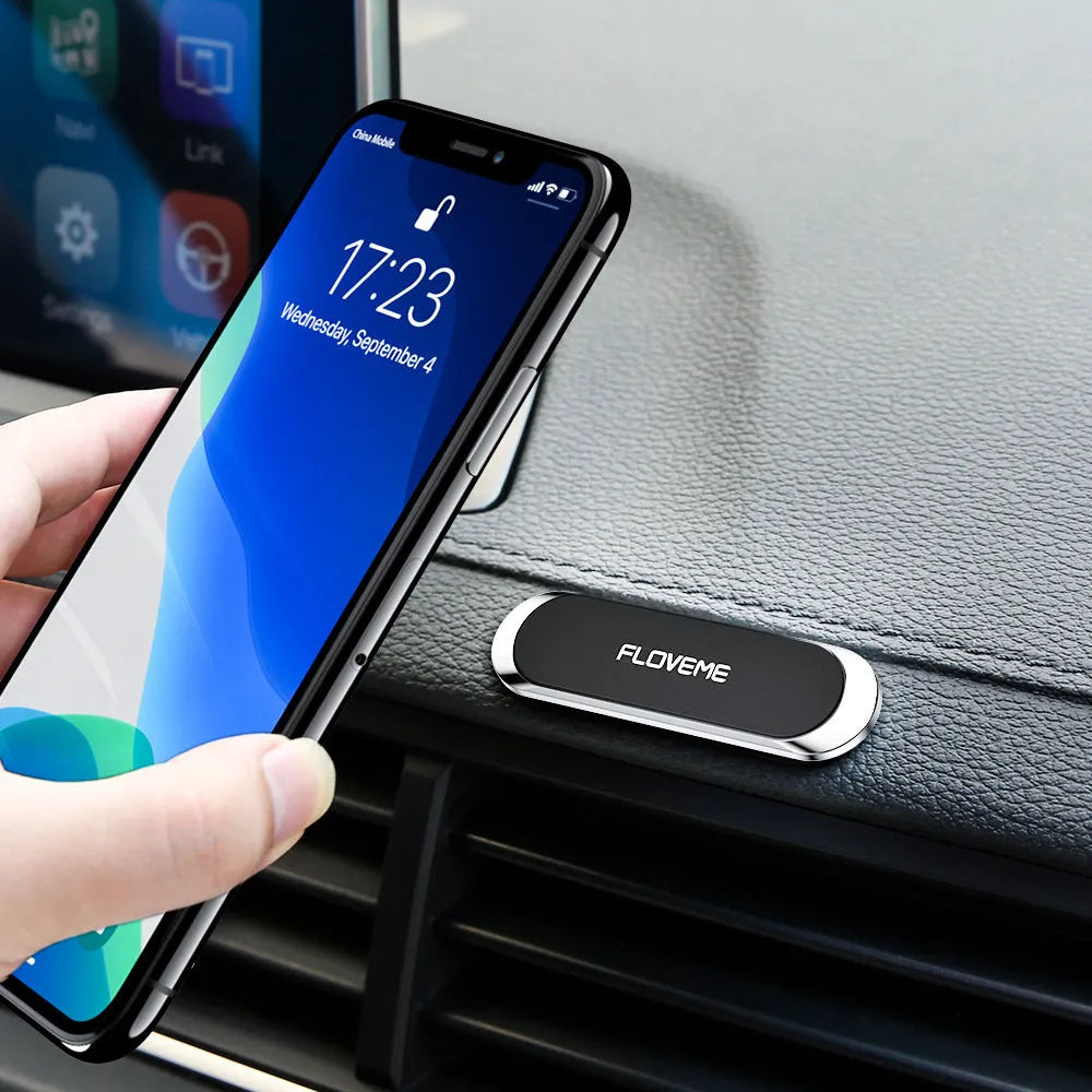 Black magnetic car phone holder with square silver iron sheet and white foam adhesive
