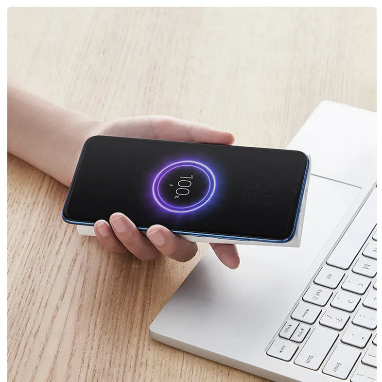 White and black 10000mAh power bank with USB-C port and wireless charging capability