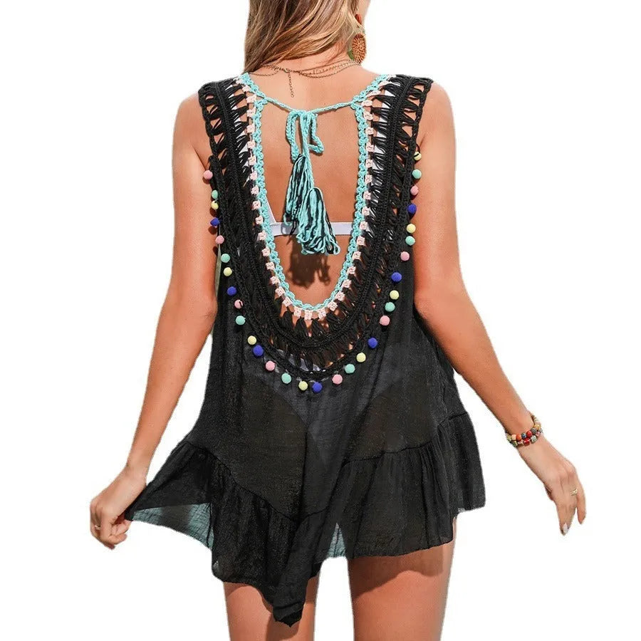 Black women's beach cover-up with hand-crocheted cut-out ruffled design