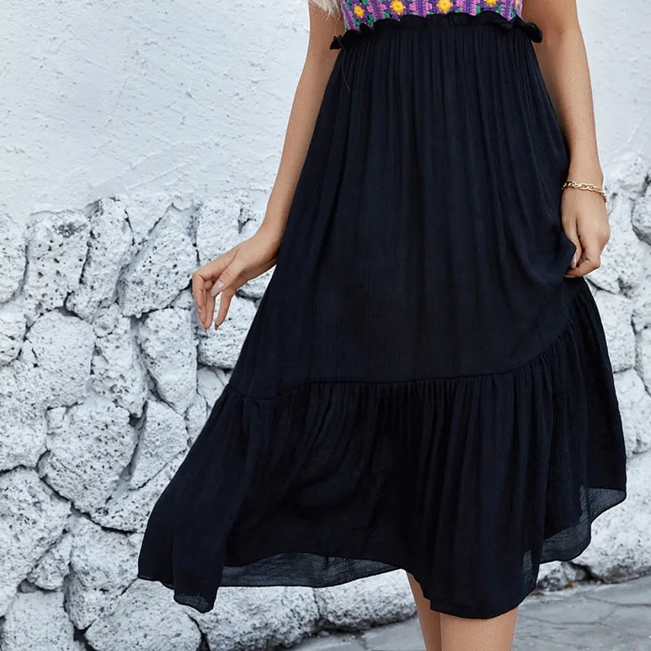 Purple women's sleeveless dress with detailed white hand hook flower stitching on the front.