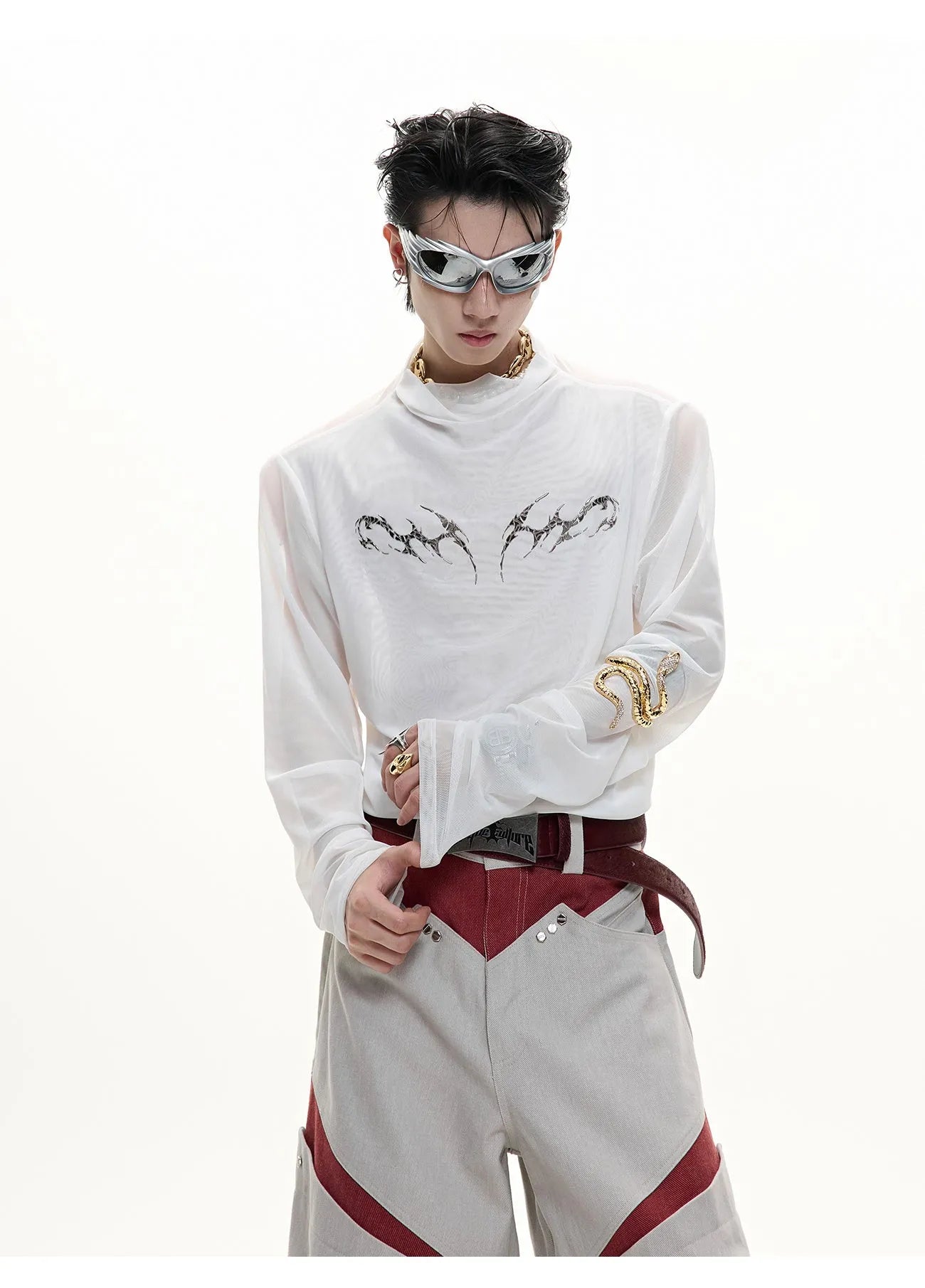 Black mesh slim-fit long sleeve bottoming shirt on a hanger, showing its lightweight texture and close cut.