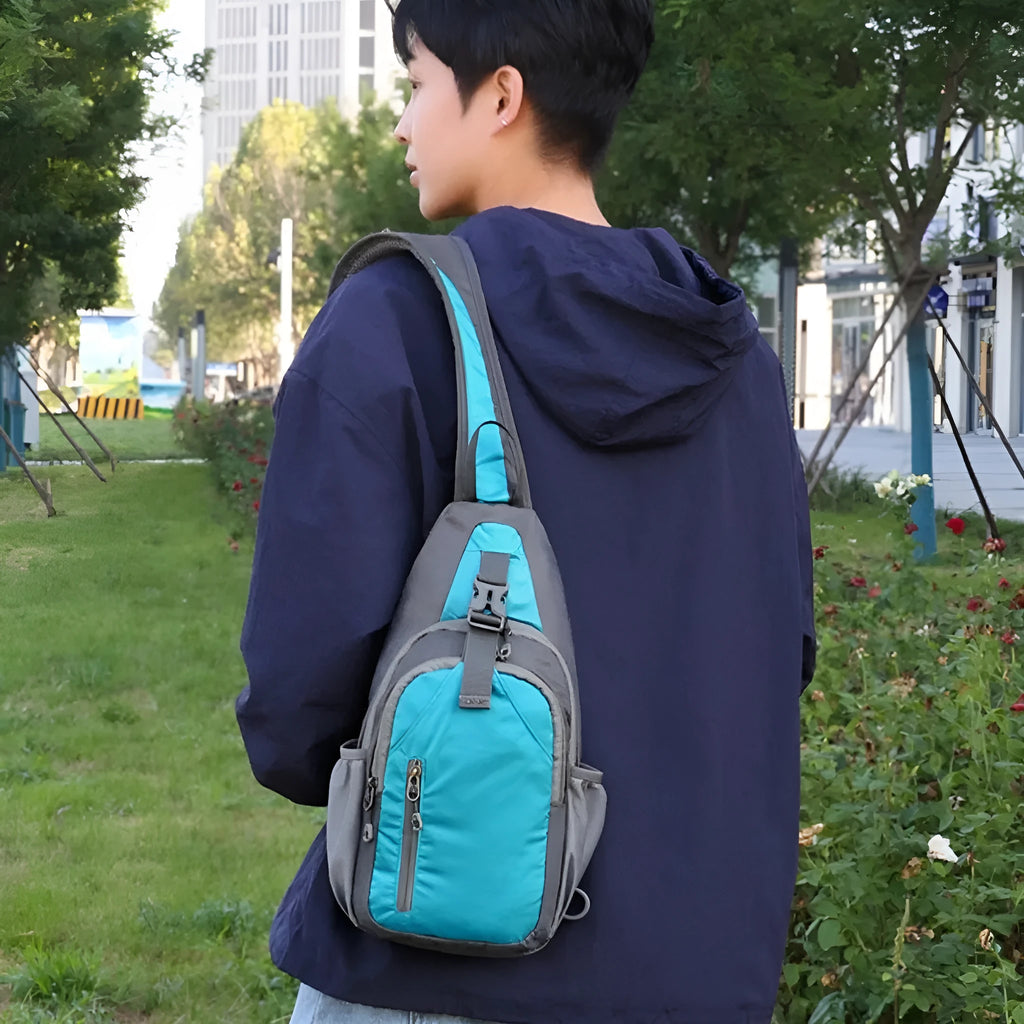 Nylon canvas crossbody chest bag in army green colour with contrast details for outdoor leisure use.