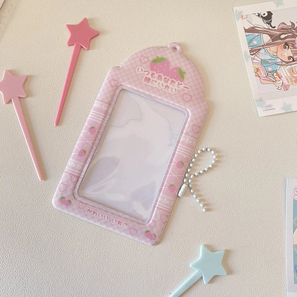 Cartoon strawberry and four-leaf clover PVC meal card holder pendants showing 3-inch card window