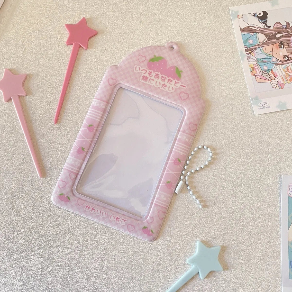 Cartoon strawberry and four-leaf clover PVC meal card holder pendants showing 3-inch card window