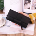 Women's long tri-fold clutch wallet in solid colour with sewing thread detail, PU leather exterior, large capacity