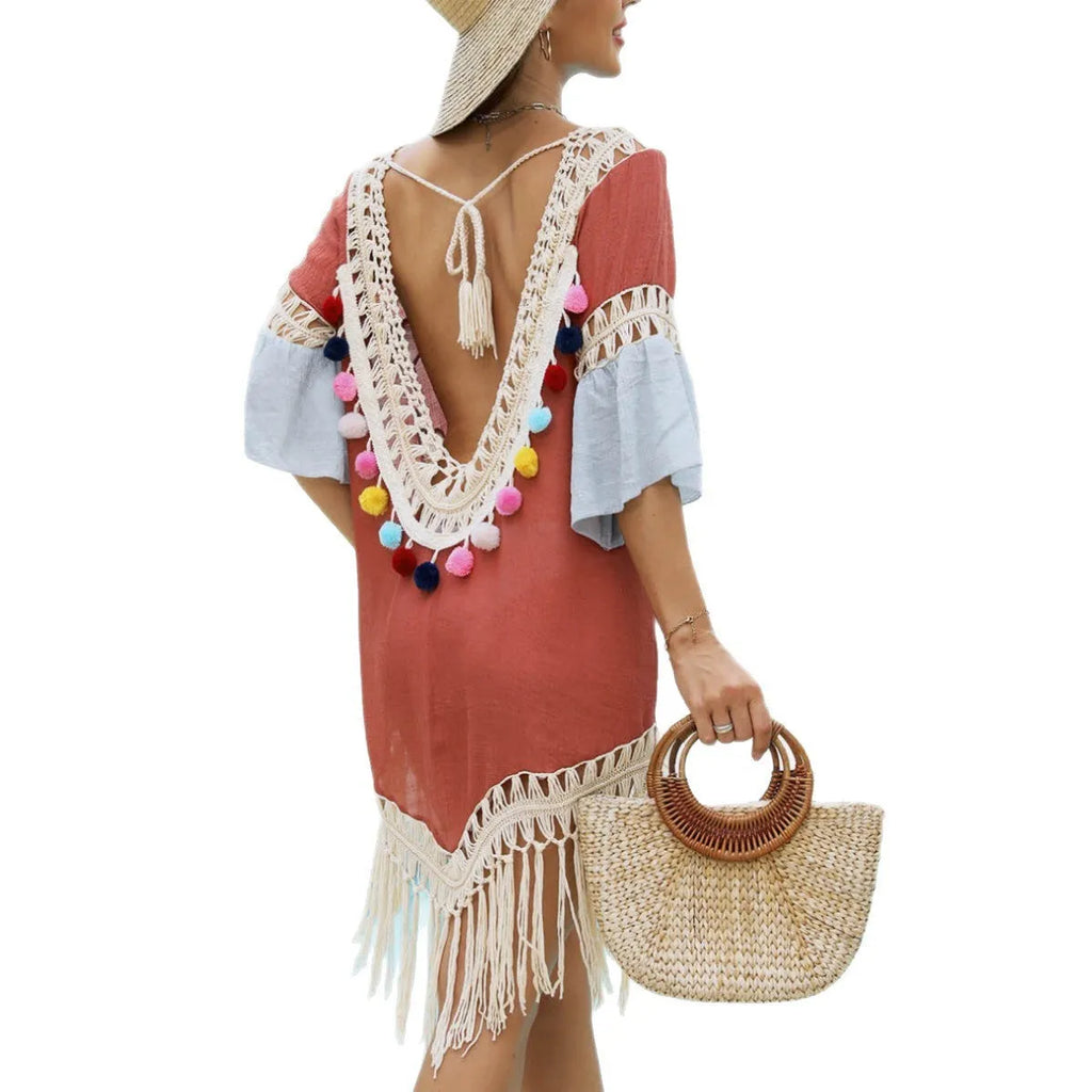 Orange beach overskirt with hand crochet stitching and floral polyester fabric, featuring tassel detailing