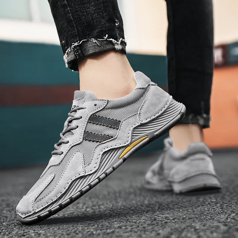 Men's grey platform hiking boots with pigskin upper and lace-up front closure