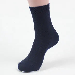 Men's bamboo fibre business socks in a small square pattern, shown in navy blue colour.