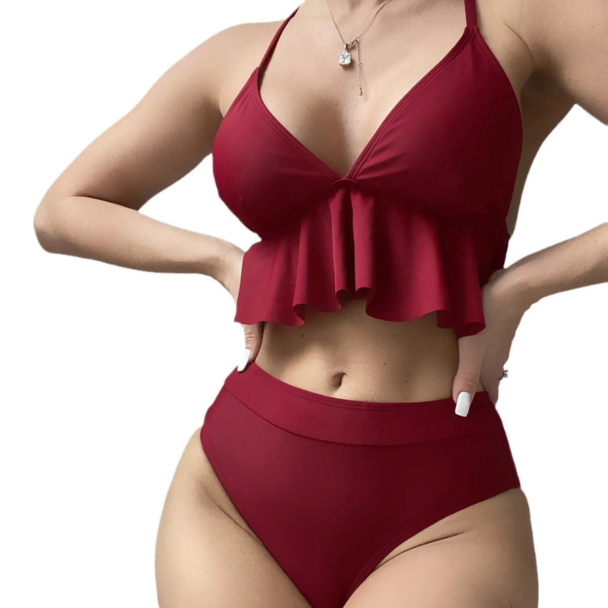 Women's solid colour high-waisted bikini with adjustable ties on the top.