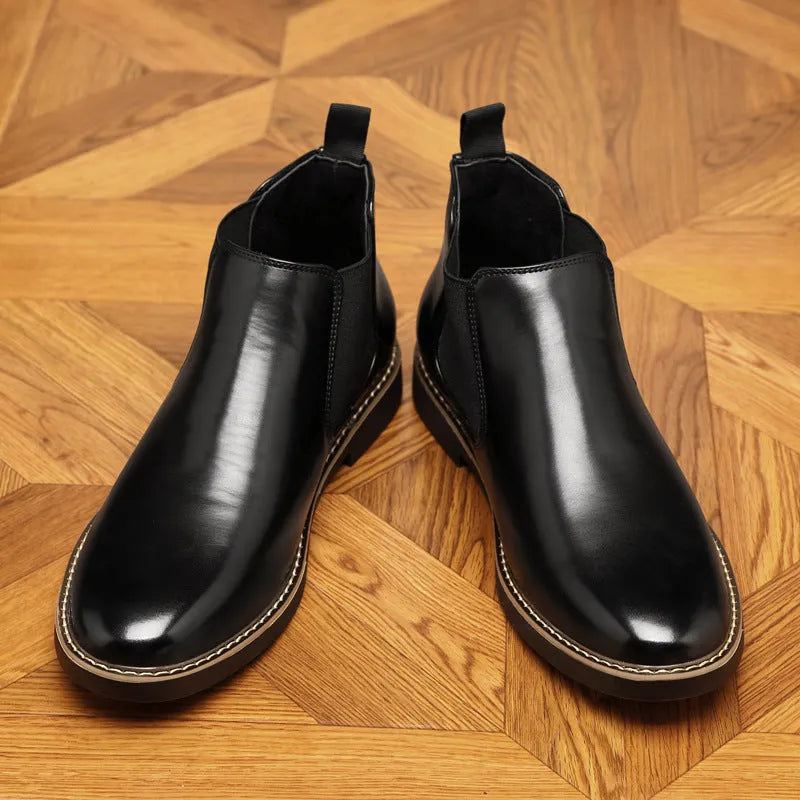 Black formal leather boots with pointed toe design and square rubber heels